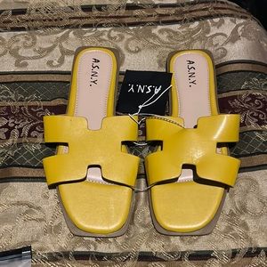 Super cute golden / mustard color flat sandals Brand A. S. N. Y.